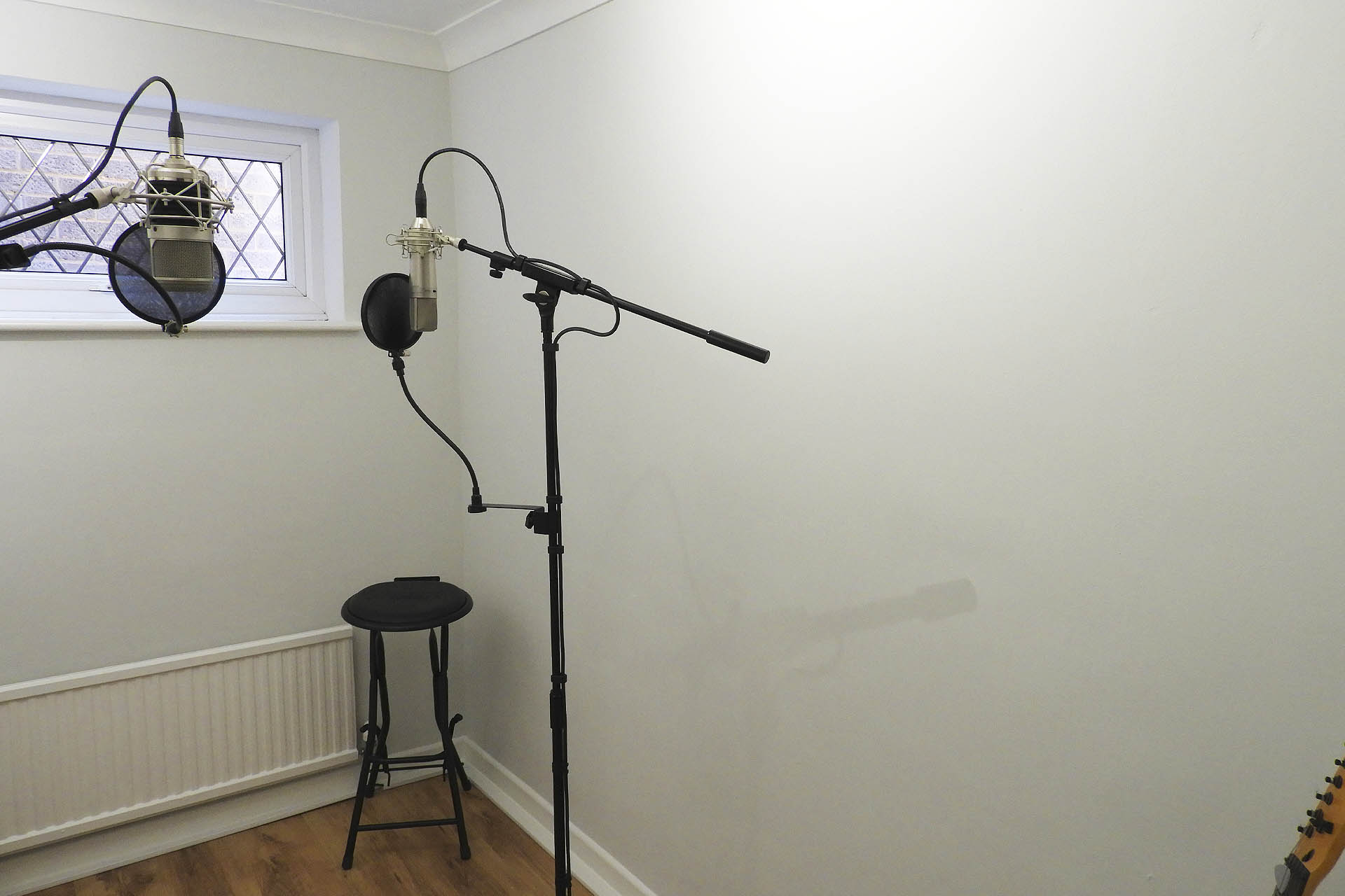 Mic room with bare (untreated) walls