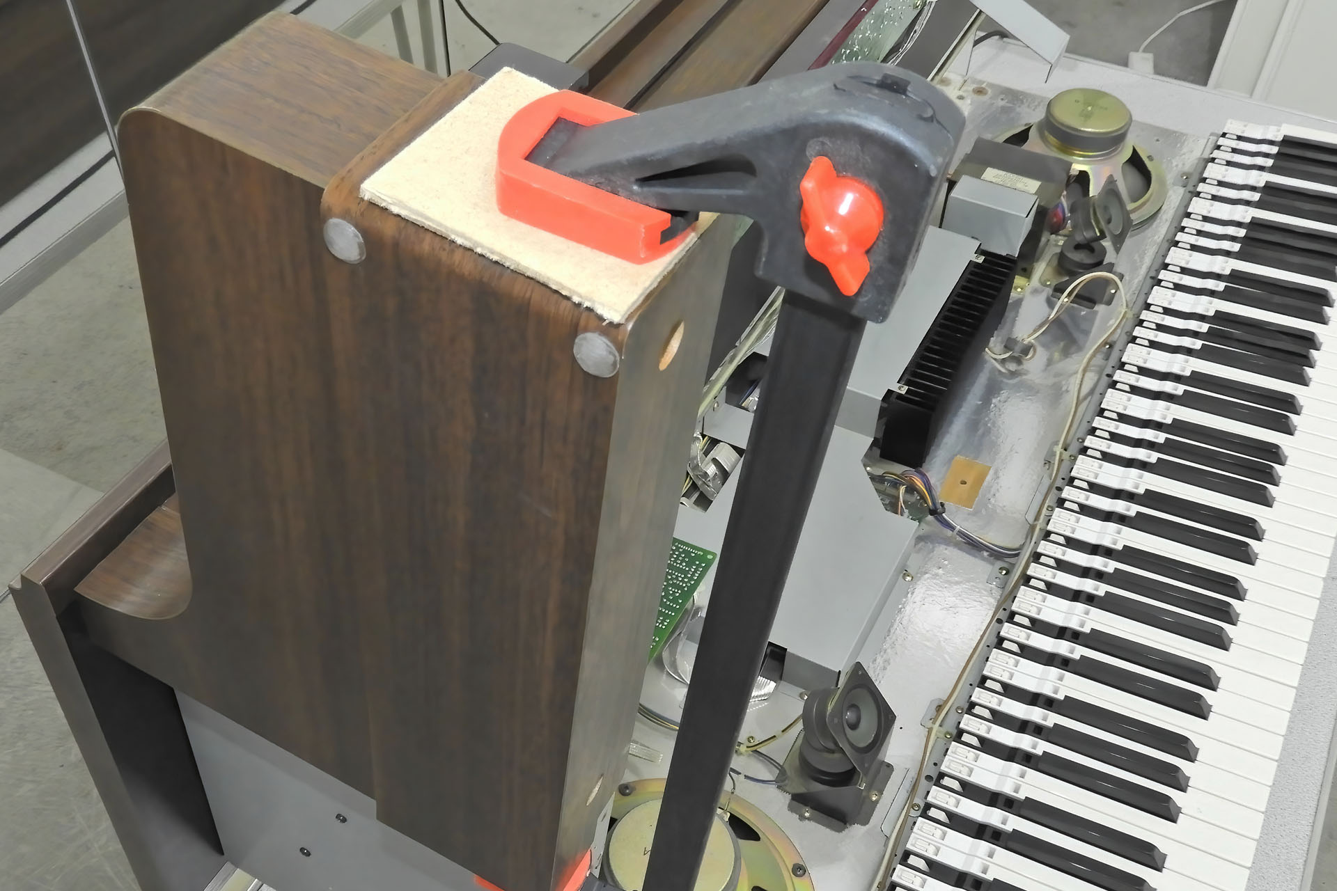 Gluing the laminate on the left hand cheek of a Roland HP-3700